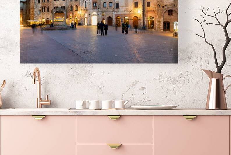 Sunset view of Piazza della Cisterna in San Gimignano Tuscany by Marco Brivio