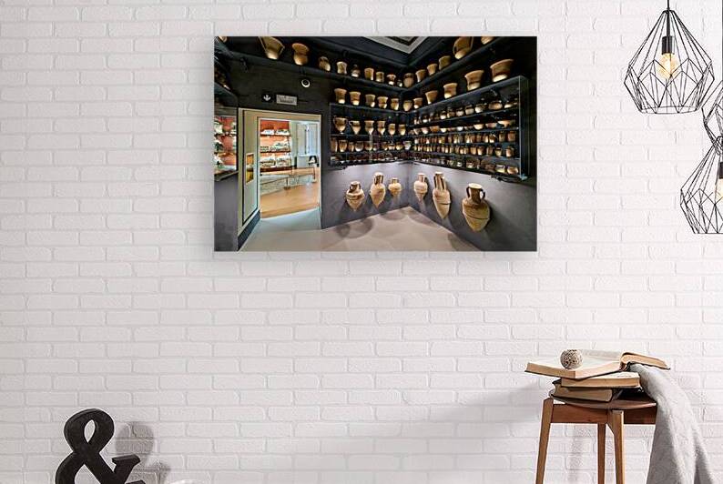 Cinerary urns in Guarnacci Museum of Etruscan artifacts by Marco Brivio