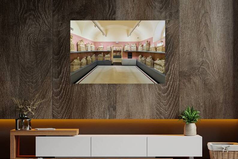 Exploring Etruscan cinerary urns at Guarnacci Museum in Volterra by Marco Brivio