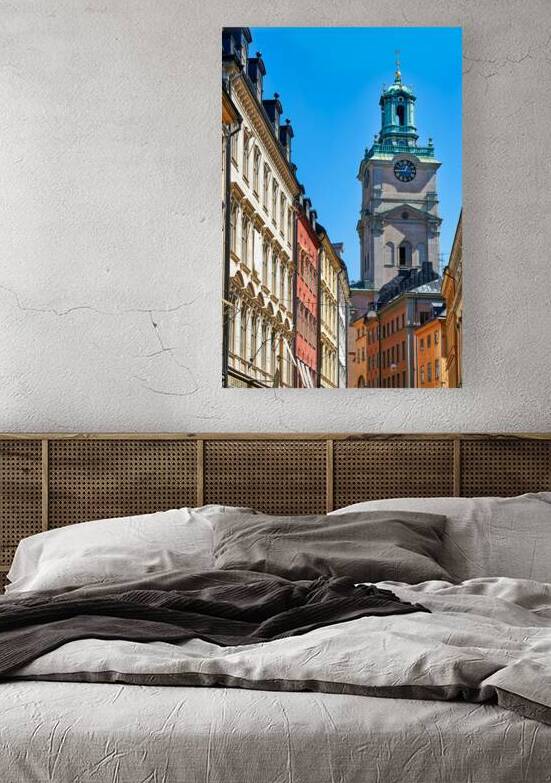 View of tall clock tower in Gamla Stan Stockholm by Marco Brivio