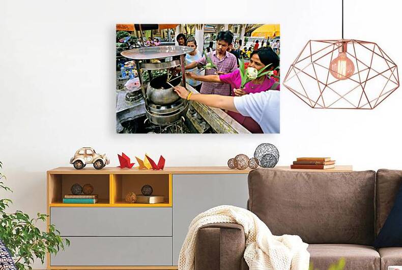 Worshippers making offerings at Wat Phra Kaew in Bangkok by Marco Brivio