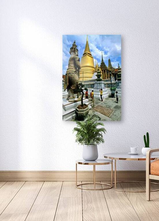 Wat Phra Kaew in Bangkok with visitors exploring the site by Marco Brivio