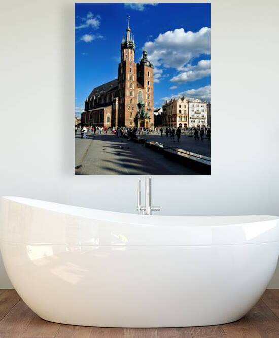 Krakows historic church and lively square in clear weather by Marco Brivio