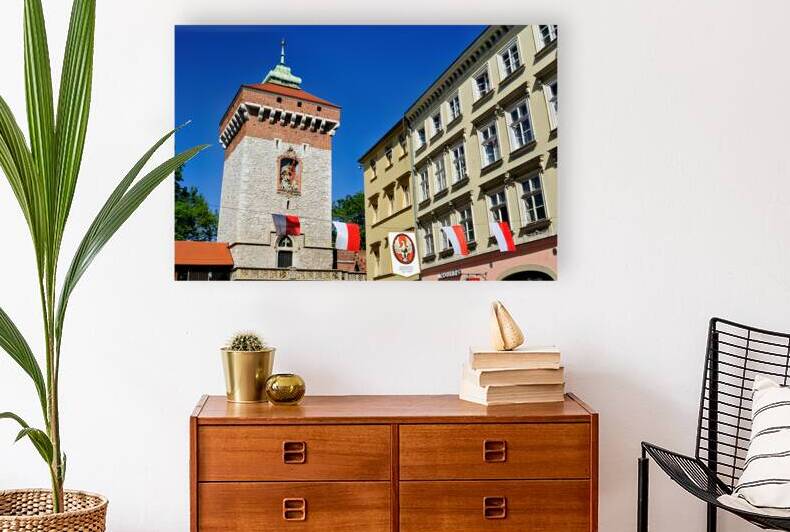 Main square in Krakow with banners and clear skies by Marco Brivio