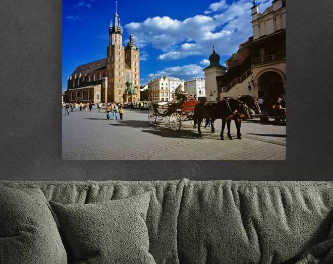 Krakow main square with horse carriage on a sunny day by Marco Brivio
