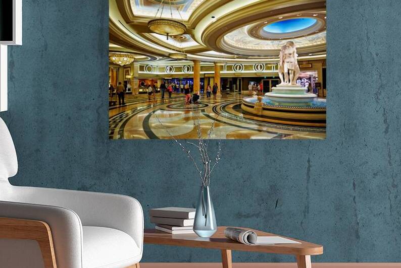 Visitors explore the lobby of Caesars Palace Hotel in Las Vegas by Marco Brivio