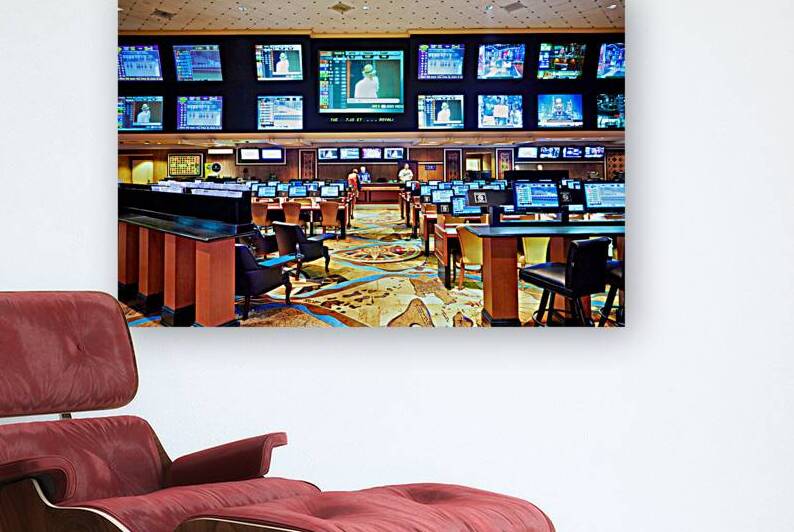 Betting area at Treasure Island Casino in Las Vegas by Marco Brivio