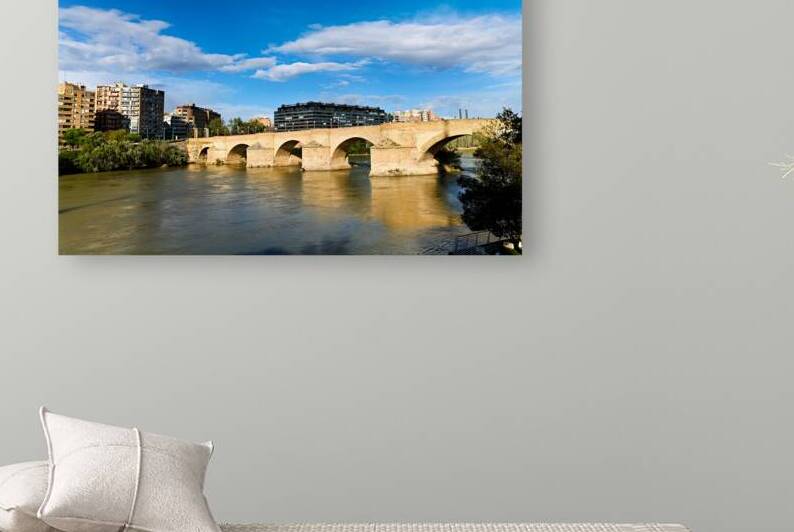 Exploring Puente de Piedra bridge in Zaragoza Spain by Marco Brivio