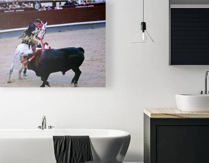 Bullfight in Madrid Spain with rider and bull in arena by Marco Brivio