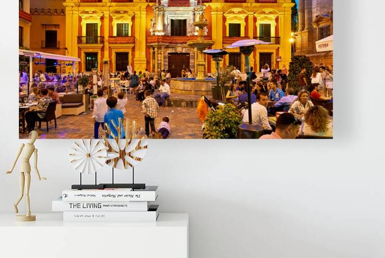 Crowds gather in Malagas downtown at night by Marco Brivio