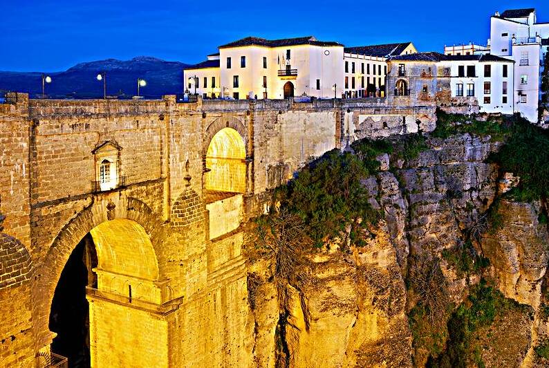 Night view of Ronda and El Tajo gorge in Andalusia by Marco Brivio